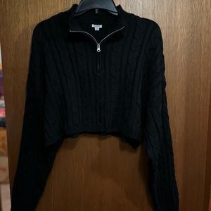 Cropped sweater top from garage. size M. Color Black. Never worn with tags